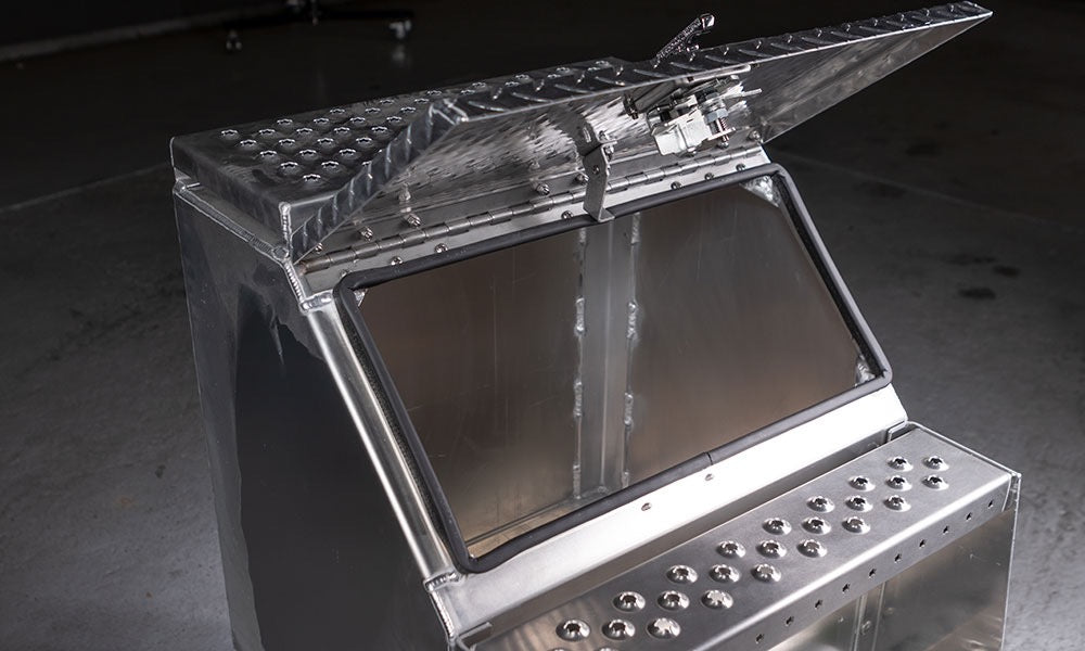 Highway Products step box with lid open on a dark background 