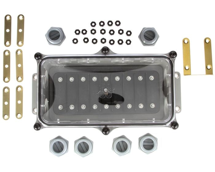 Mechanical assembly with a clear cover, screws, and metal components on a white background