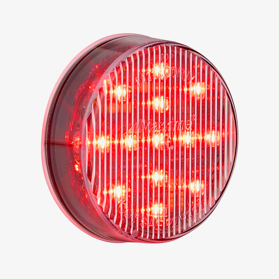 Red round light on a white background