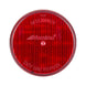Red Maxxima automotive light on a white background