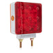 Rectangular red safety light with metallic base on a white background