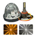 Car headlight bulb with clear lens and amber and white star light pattern on a white background.