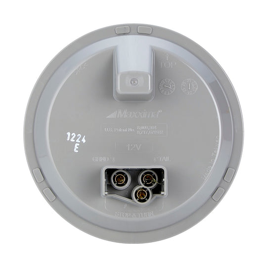 Gray automotive light bulb socket with Maxxima branding on a white background