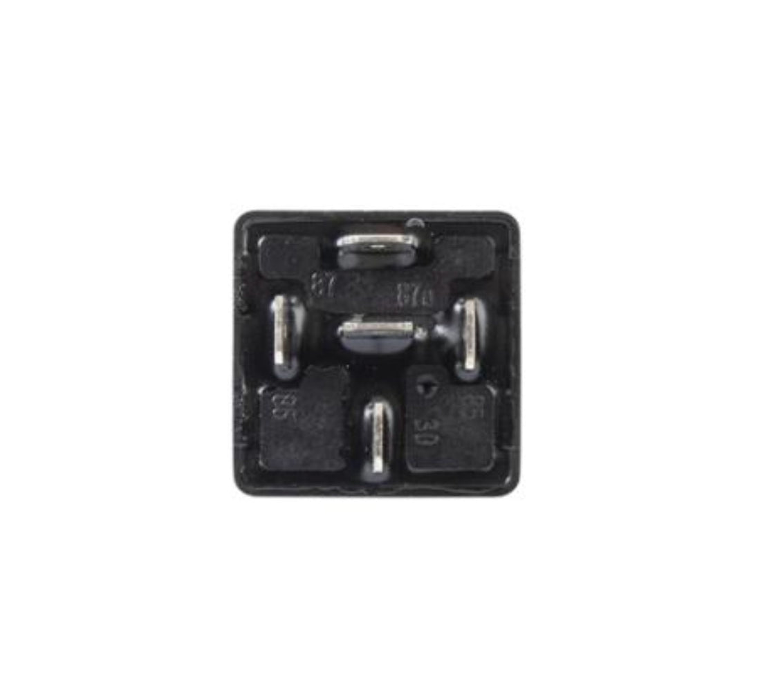 Black plastic component with metallic pins on a white background