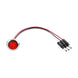 Small round red light with wiring on a white background