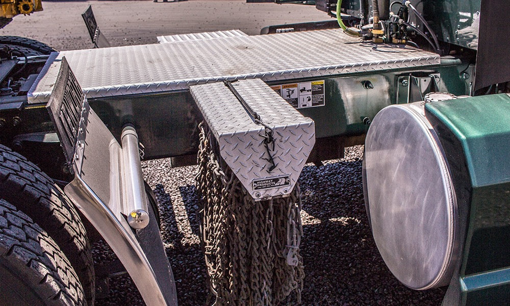 Highway Products chain hanger on truck frame between quarter fender and fuel tank