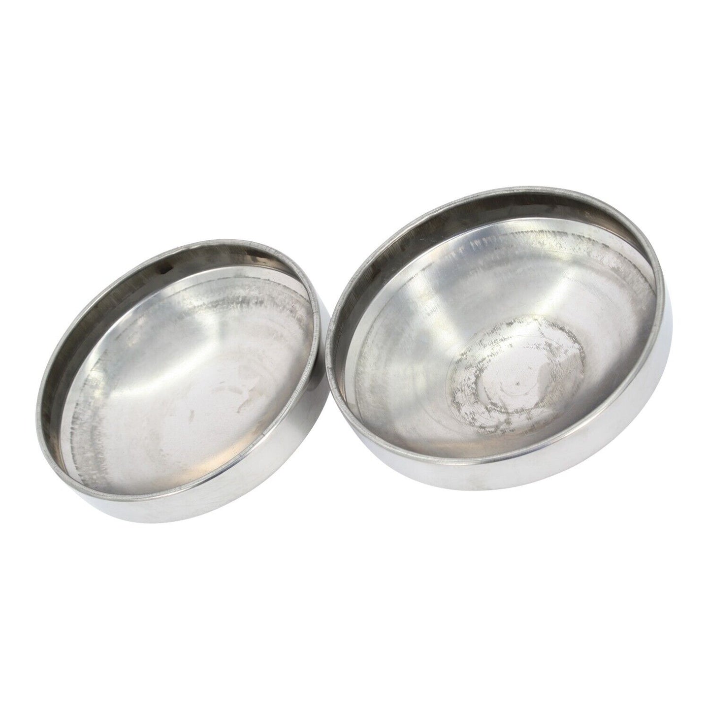 inside of two Stainless steel hub cap on a white background