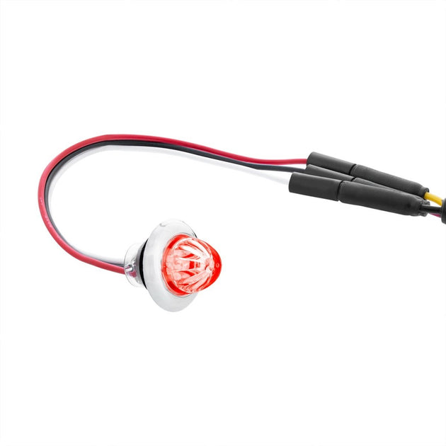 Red LED light with wiring on a white background